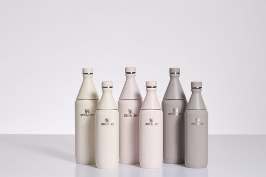 Stanley All Day Slim Bottle 34 oz | Twist On Lid with Leakproof Seal | Slim Design for Travel & Gym | Insulated Stainless Steel | BPA-Free | Cream