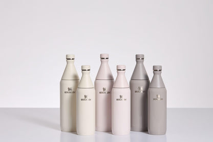 Stanley All Day Slim Bottle 34 oz | Twist On Lid with Leakproof Seal | Slim Design for Travel & Gym | Insulated Stainless Steel | BPA-Free | Rose Quartz