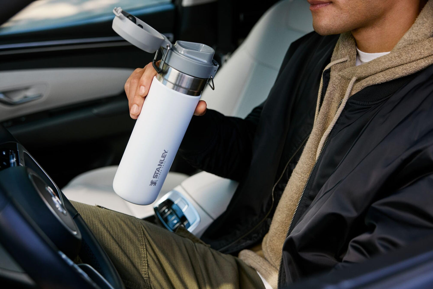 Stanley Quick Flip GO Water Bottle 36 oz | Push Button Lid | Leakproof and Packable for Travel and Sports | Insulated Stainless Steel | BPA-Free | Frost
