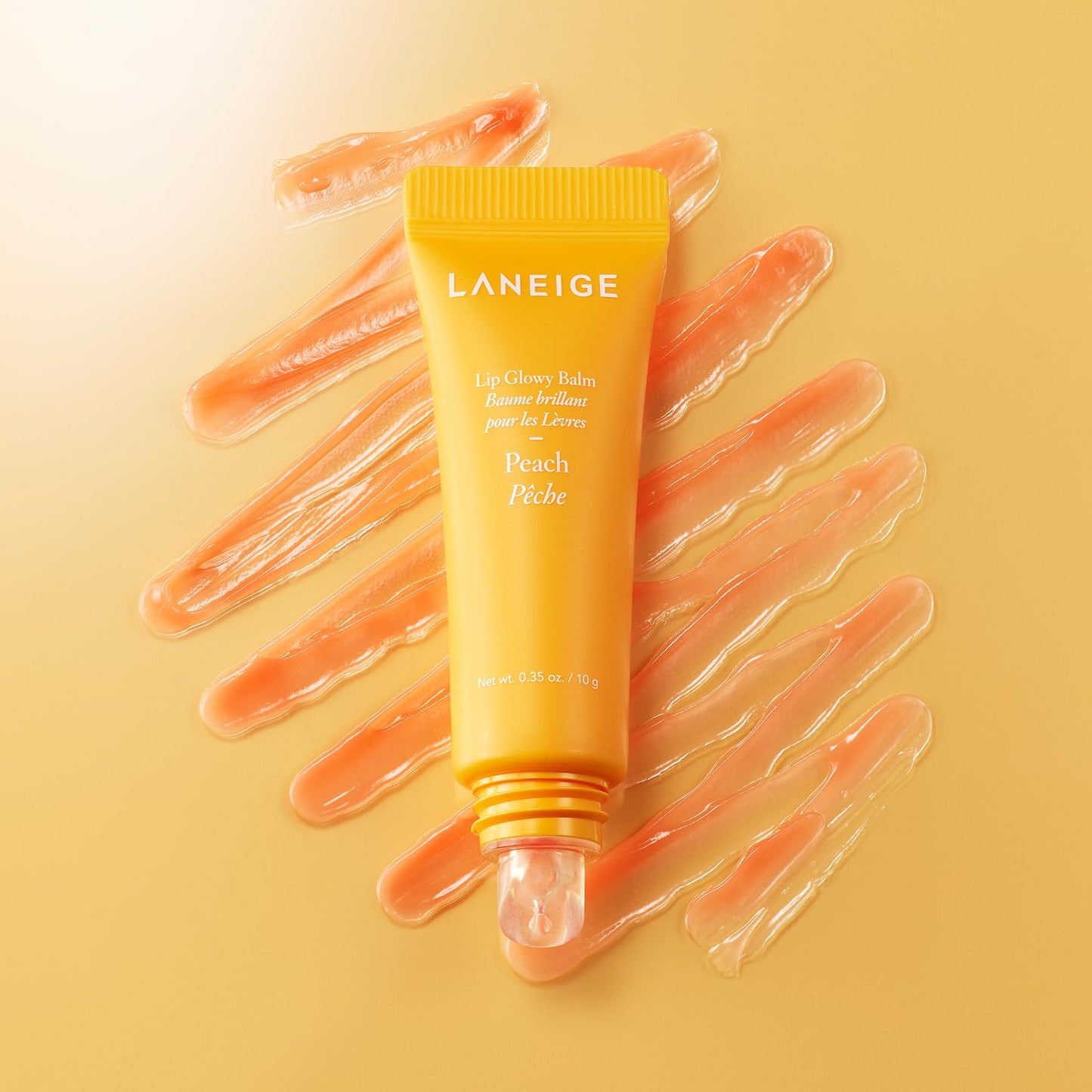 LANEIGE Lip Glowy Balm, Peach: Sheer Tinted Lip Moisturizer with Shea Butter, for Hydrating Shine & Soft Lips