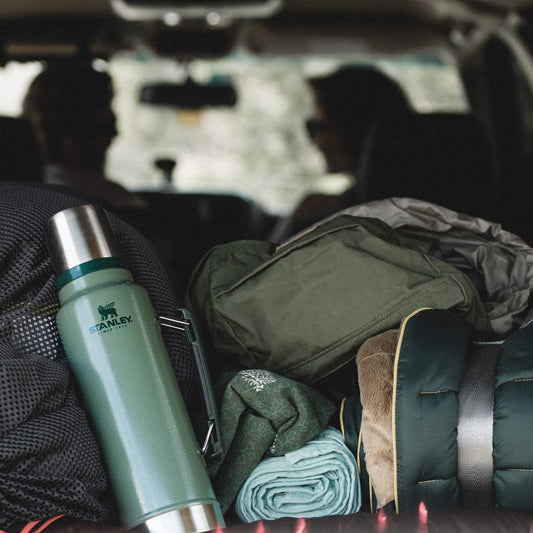 Stanley Classic Legendary Vacuum Bottle 2.0 qt | Wide Mouth with Leakproof Cup Lid | Keep Drinks Hot or Cold | Packable for Travel | Insulated Stainless Steel Thermos | BPA-Free | Matte Black